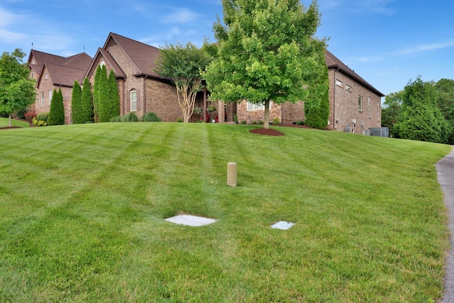 1794 Balvenie Ct, Brentwood, TN 37027 - view of front facade with brick siding and a front lawn
