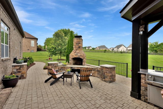 1794 Balvenie Ct, Brentwood, TN 37027 - view of patio featuring an outdoor stone fireplace and an outdoor kitchen