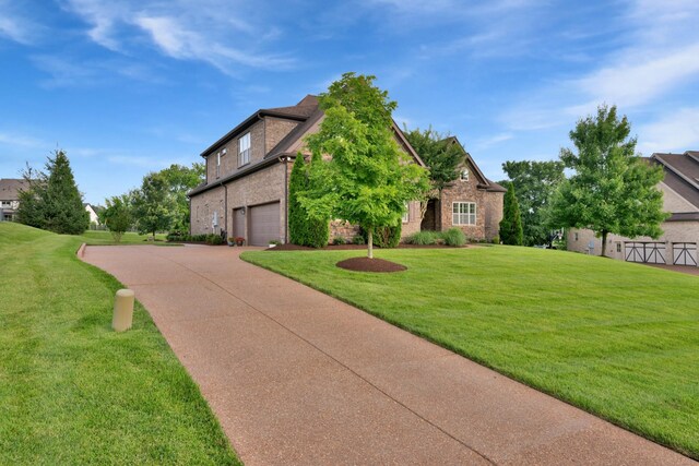 1794 Balvenie Ct, Brentwood, TN 37027 - traditional-style house featuring brick siding, concrete driveway, and a front lawn