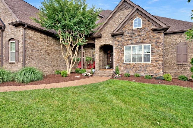 1794 Balvenie Ct, Brentwood, TN 37027 - view of front of home featuring a front lawn, roof with shingles, brick siding, and stone siding