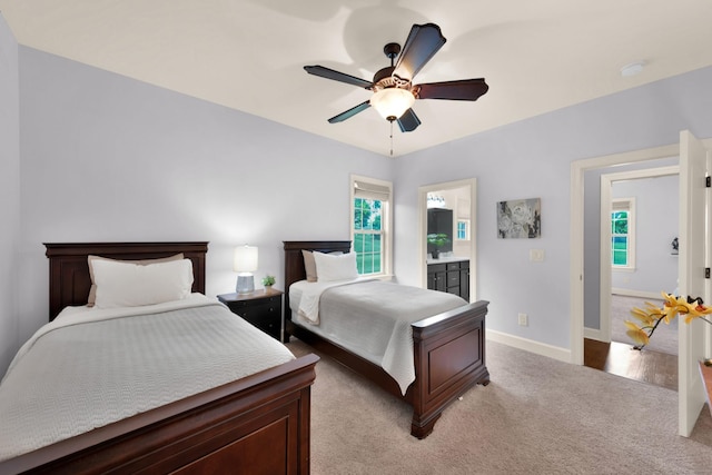 1794 Balvenie Ct, Brentwood, TN 37027 - bedroom featuring multiple windows, carpet flooring, ceiling fan, and ensuite bath
