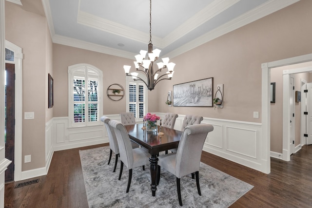 1794 Balvenie Ct, Brentwood, TN 37027 - dining space featuring dark wood finished floors, a chandelier, a tray ceiling, wainscoting, and ornamental molding