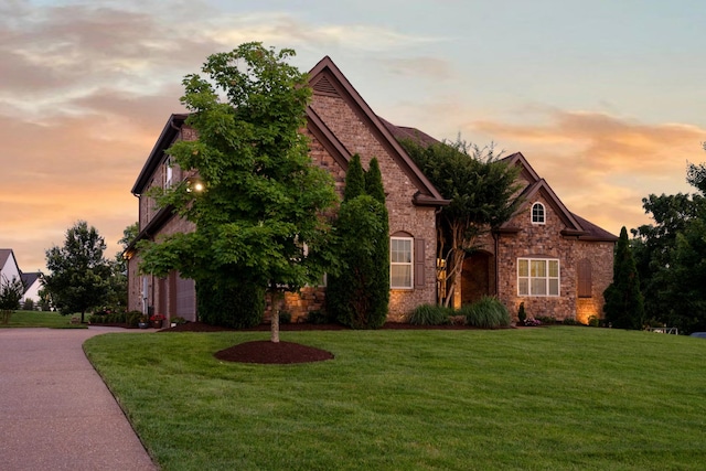 1794 Balvenie Ct, Brentwood, TN 37027 - view of front of property with a front lawn, stone siding, and driveway