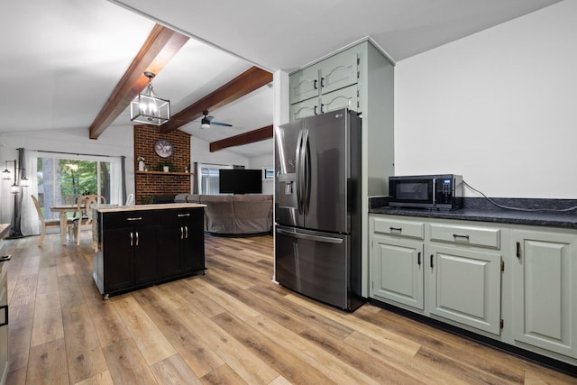 5920 Dogwood Dr, Harrison, TN 37341 - kitchen featuring stainless steel refrigerator with ice dispenser, black microwave, light wood finished floors, a kitchen island, and ceiling fan