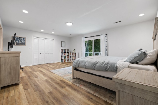 5920 Dogwood Dr, Harrison, TN 37341 - bedroom with recessed lighting, light wood finished floors, and a closet