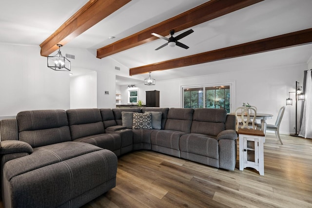 5920 Dogwood Dr, Harrison, TN 37341 - living area with wood finished floors, ceiling fan, and a chandelier
