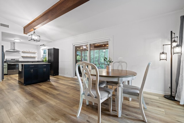 5920 Dogwood Dr, Harrison, TN 37341 - dining space with light wood-type flooring and ornamental molding