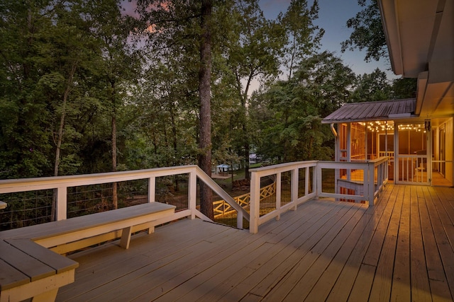 5920 Dogwood Dr, Harrison, TN 37341 - deck at dusk featuring a sunroom