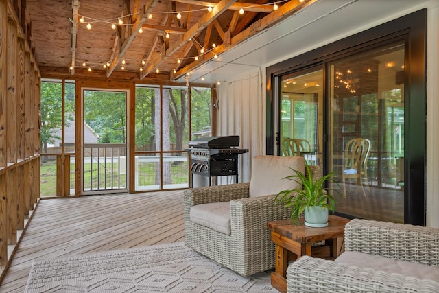5920 Dogwood Dr, Harrison, TN 37341 - sunroom / solarium featuring hardwood / wood-style flooring, healthy amount of natural light, beamed ceiling, and a wooden deck
