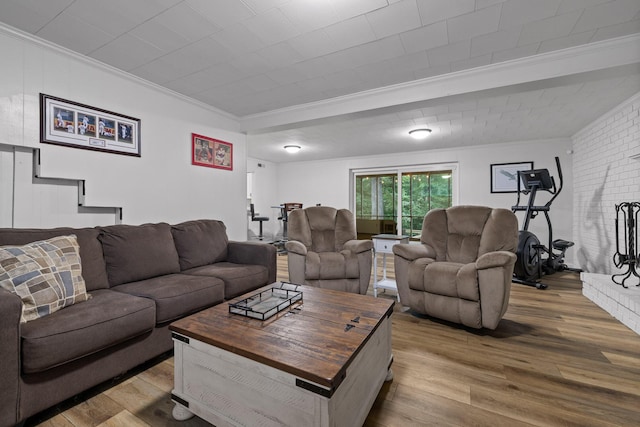 5920 Dogwood Dr, Harrison, TN 37341 - living room featuring crown molding, wood finished floors, and stairs