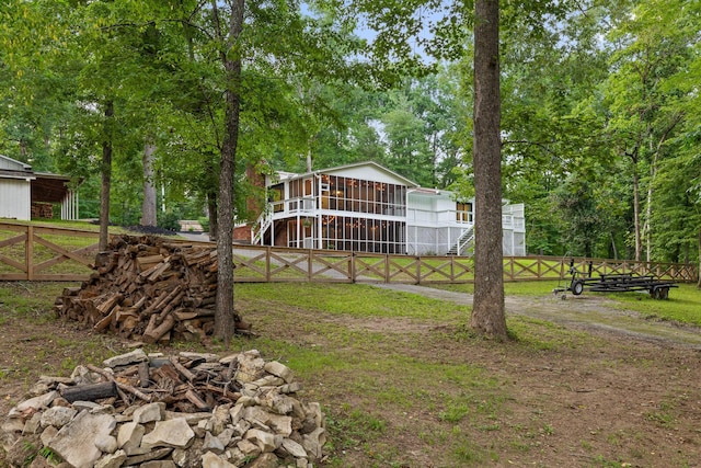 5920 Dogwood Dr, Harrison, TN 37341 - view of yard with an outdoor fire pit, a sunroom, and stairway