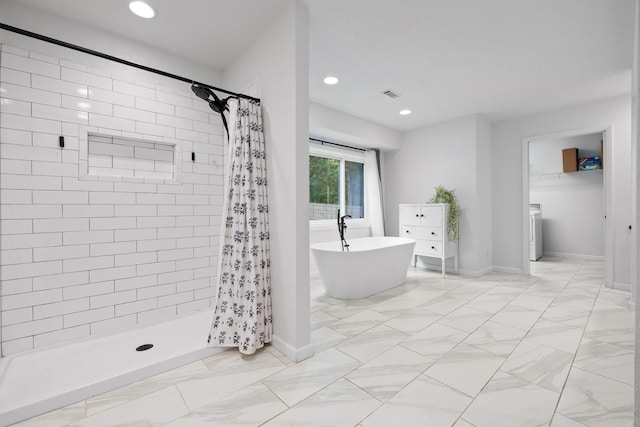 5920 Dogwood Dr, Harrison, TN 37341 - bathroom with a shower stall, recessed lighting, a freestanding bath, and marble finish flooring