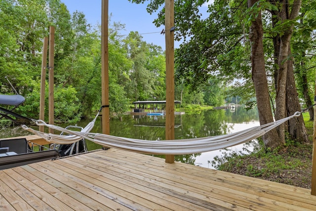5920 Dogwood Dr, Harrison, TN 37341 - wooden deck with a dock, a water view, and view of wooded area