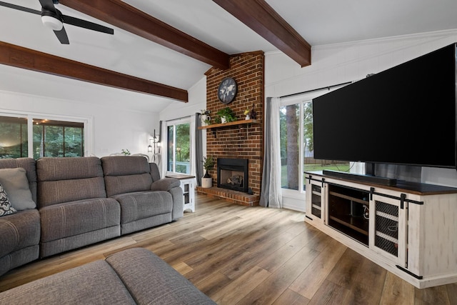 5920 Dogwood Dr, Harrison, TN 37341 - living room featuring a ceiling fan, wood finished floors, and a fireplace