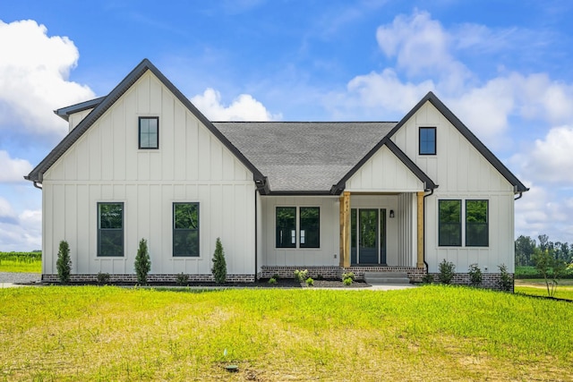 934 Butler Bridge Rd, Portland, TN 37148 - modern farmhouse with roof with shingles, board and batten siding, and a front yard