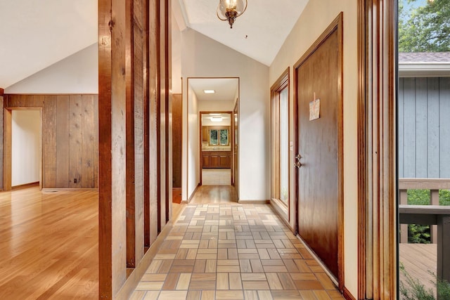 5122 Prince Phillip Cv, Brentwood, TN 37027 - corridor with vaulted ceiling and wood walls