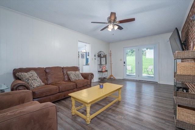 332 Old Dunbar Cave Rd, Clarksville, TN 37043 - living area featuring wood finished floors, a ceiling fan, and ornamental molding