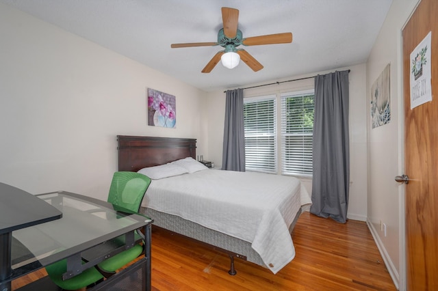 332 Old Dunbar Cave Rd, Clarksville, TN 37043 - bedroom with wood finished floors and a ceiling fan