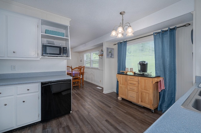 332 Old Dunbar Cave Rd, Clarksville, TN 37043 - kitchen featuring black dishwasher, stainless steel microwave, dark wood finished floors, open shelves, and a textured ceiling