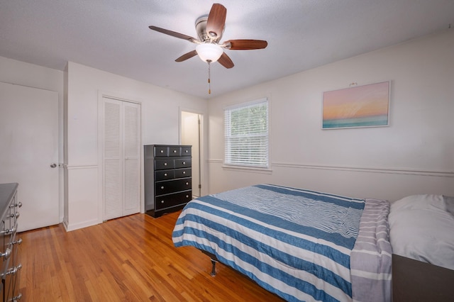 332 Old Dunbar Cave Rd, Clarksville, TN 37043 - bedroom featuring wood finished floors, a closet, and a ceiling fan