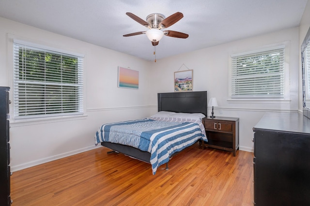 332 Old Dunbar Cave Rd, Clarksville, TN 37043 - bedroom with light wood finished floors and a ceiling fan