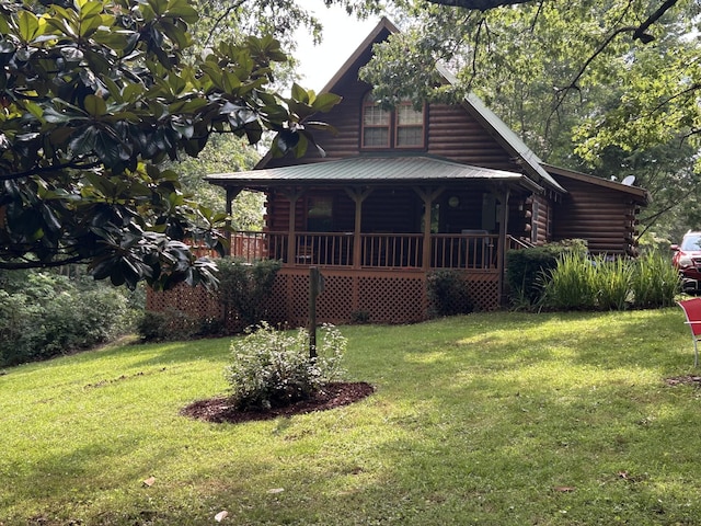 10 Meadow Brook Ln, Spencer, TN 38585 - log cabin with log siding, a porch, and a front lawn