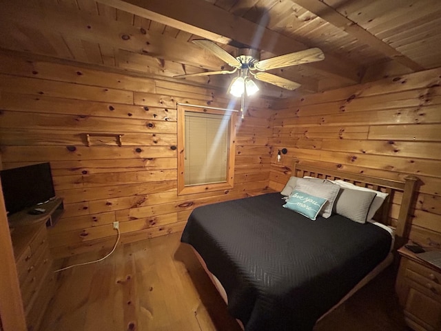 10 Meadow Brook Ln, Spencer, TN 38585 - bedroom featuring a wooden ceiling with exposed beams, light wood finished floors, wood walls, and a ceiling fan