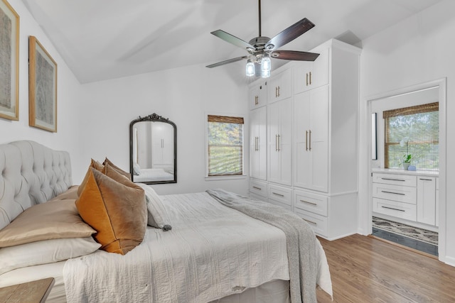 4200 Hunters Point Pike, Lebanon, TN 37087 - bedroom with light wood-type flooring, lofted ceiling, ensuite bath, and ceiling fan