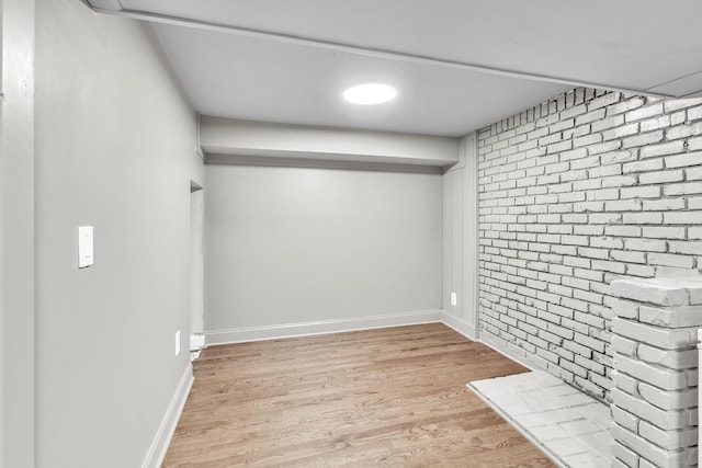 4200 Hunters Point Pike, Lebanon, TN 37087 - finished basement with wood finished floors and brick wall