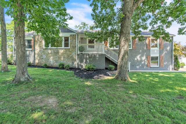 4200 Hunters Point Pike, Lebanon, TN 37087 - view of front facade with a front lawn, stone siding, stairway, and covered porch