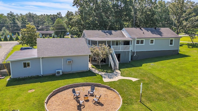 4200 Hunters Point Pike, Lebanon, TN 37087 - rear view of house featuring a fire pit, stairs, a lawn, and roof with shingles