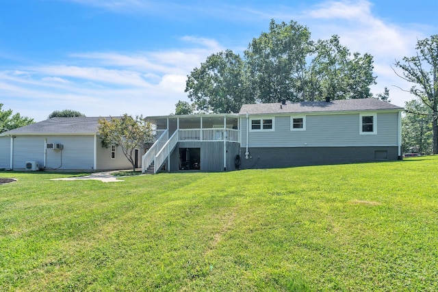 4200 Hunters Point Pike, Lebanon, TN 37087 - back of property featuring stairs, a lawn, and a sunroom