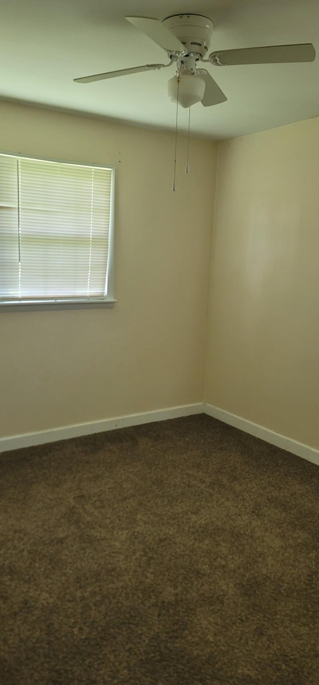 205 Galen Rd, Lafayette, TN 37083 - unfurnished room featuring a ceiling fan and dark carpet