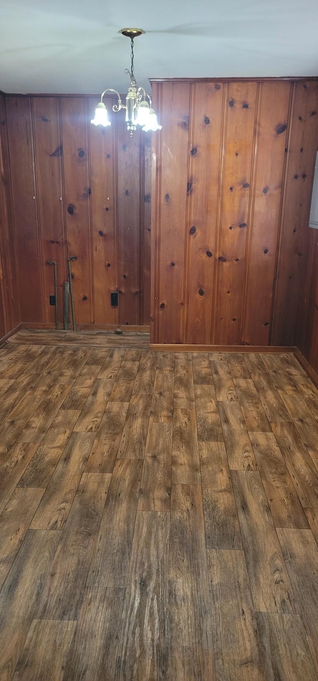 205 Galen Rd, Lafayette, TN 37083 - unfurnished dining area featuring wood-type flooring and a chandelier
