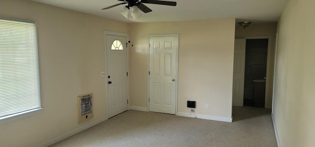 205 Galen Rd, Lafayette, TN 37083 - foyer with heating unit, ceiling fan, and carpet floors