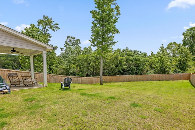 5086 Oop Rd, Chattanooga, TN 37416 - fenced backyard with a ceiling fan and a patio