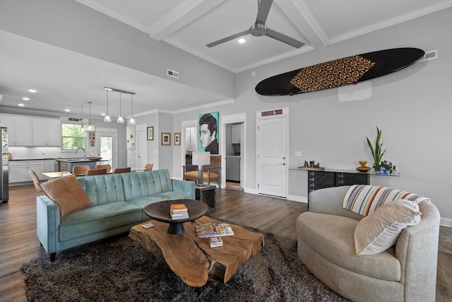 5086 Oop Rd, Chattanooga, TN 37416 - living area with dark wood finished floors, beamed ceiling, crown molding, a ceiling fan, and recessed lighting