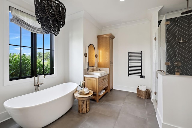 4720 Edwardian Trce, Franklin, TN 37067 - full bath with a shower stall, vanity, a freestanding tub, a chandelier, and tile patterned flooring