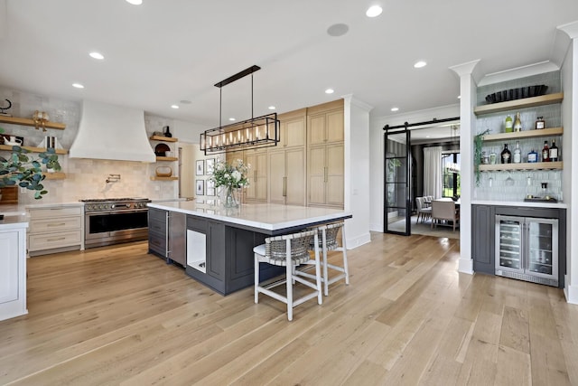 4720 Edwardian Trce, Franklin, TN 37067 - kitchen with open shelves, stainless steel appliances, wine cooler, premium range hood, and light countertops