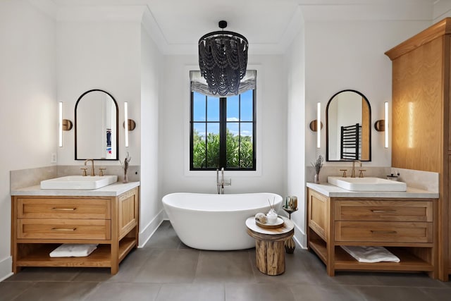 4720 Edwardian Trce, Franklin, TN 37067 - full bath featuring two vanities, a soaking tub, a chandelier, and tile patterned floors