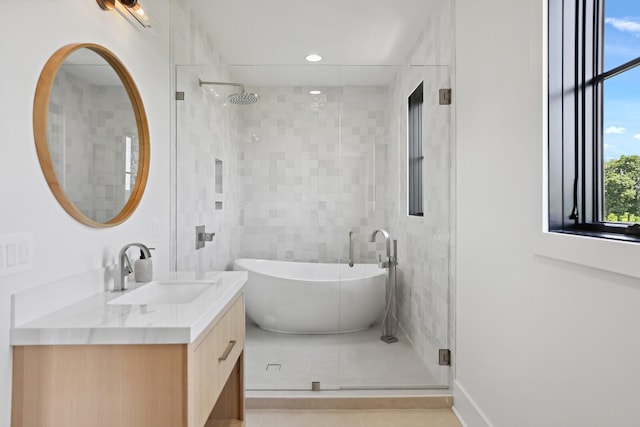4720 Edwardian Trce, Franklin, TN 37067 - full bathroom featuring vanity, a freestanding bath, a shower stall, and tile patterned floors