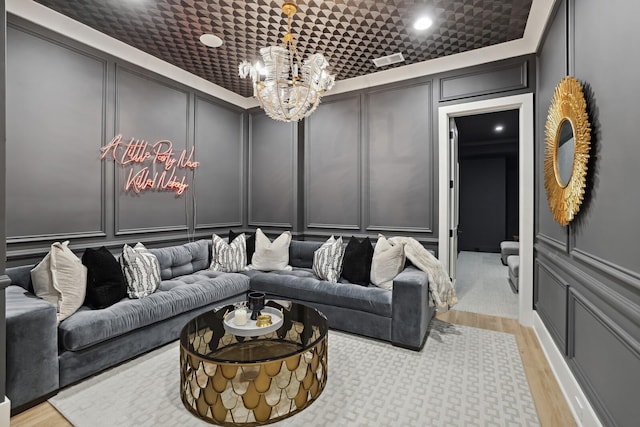 4720 Edwardian Trce, Franklin, TN 37067 - living room featuring a decorative wall, a chandelier, light wood-style flooring, and recessed lighting