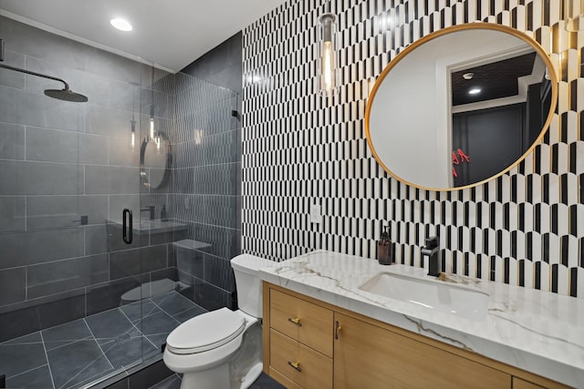 4720 Edwardian Trce, Franklin, TN 37067 - bathroom featuring vanity, a tile shower, and tile walls