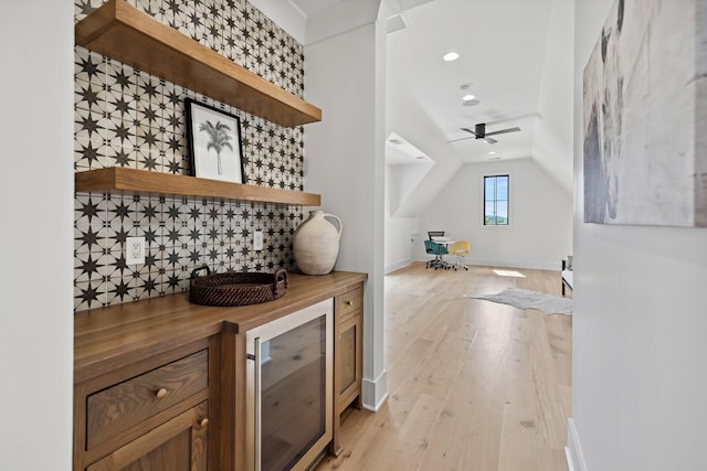 4720 Edwardian Trce, Franklin, TN 37067 - indoor dry bar featuring wine cooler, lofted ceiling, light wood-style flooring, a ceiling fan, and recessed lighting
