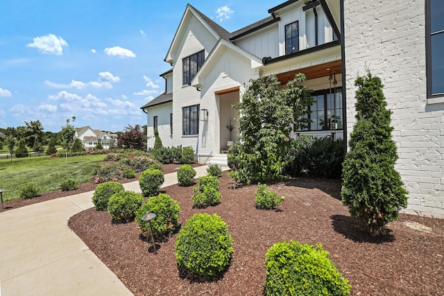 4720 Edwardian Trce, Franklin, TN 37067 - view of front facade featuring brick siding and a front lawn