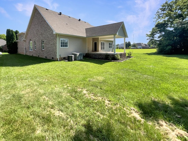 3624 Prestwicke Pl, Adams, TN 37010 - back of house with crawl space, a lawn, a shingled roof, and brick siding
