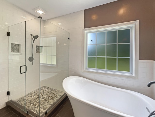3624 Prestwicke Pl, Adams, TN 37010 - full bath with a soaking tub, a stall shower, and tile walls