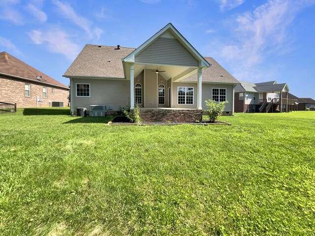 3624 Prestwicke Pl, Adams, TN 37010 - rear view of property featuring a ceiling fan, a yard, and a shingled roof