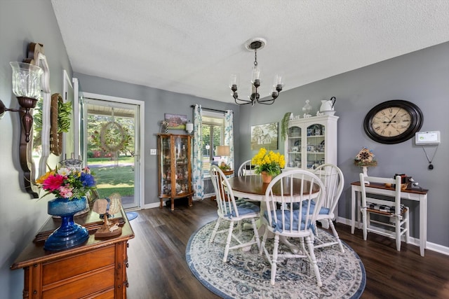106 Mcfarlin Rd, Murfreesboro, TN 37130 - dining room featuring a chandelier, a textured ceiling, and wood finished floors