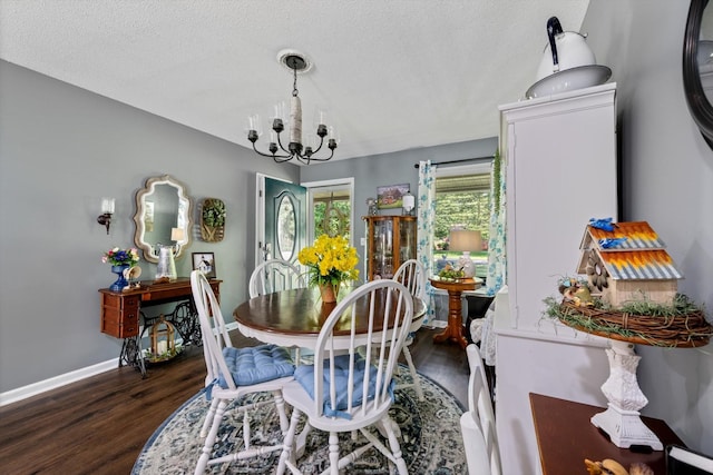 106 Mcfarlin Rd, Murfreesboro, TN 37130 - dining space with a chandelier, wood finished floors, and a textured ceiling